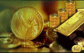 Close-up of gold coins and a gold bar symbolizing wealth.