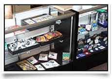 Display case filled with trading cards and collectibles.